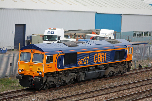 66737 in new GBRf Europorte livery after re-paint at Brush departs Loughborough Holding Sidings on 15.4.11 with 0Z66 1550 Loughborough Brush - Peterborough. Note last 2 large digits of number