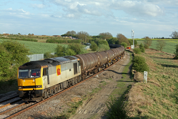60015'Bow Fell'at Wistow heading towards Leicester on 11.4.11 with 6E38 1354 Colnbrook - Lindsey Oil Refinery empty bogie tanks