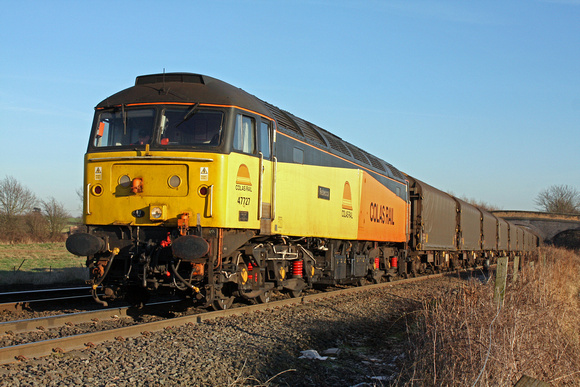Colas Rail 47727 'Rebecca' waits to depart Stenson Bubble, on the Castle Donington branch' on 16.1.12 with 6M08 1152 Boston Docks - Washwood Heath with loaded steel carriers running via Burton Upon Tr