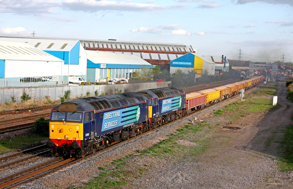 57011 & 57004 both working hard thunder through Loughborough on 14.4.14 with 6C89 1656 Mountsorrel Sdgs - Carlisle N.Y. loaded ballast box wagons some 78 mins late due to 66304 failing on the inward w