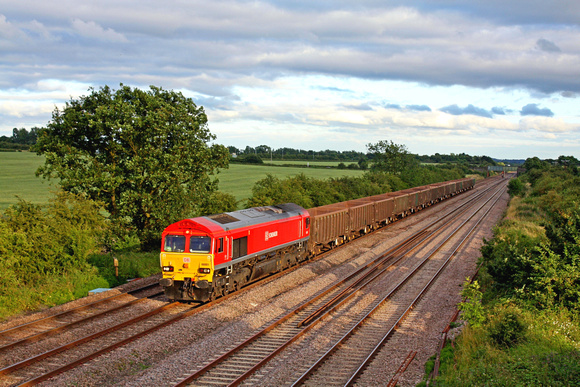66001 in DB Schenker livery at Cossington, MML on 3.7.14 with 6M29 1514 Harlow Mill Recp - Mountsorrel Sdgs empty stone wagons seen at 8pm in low sun just highlighting the train