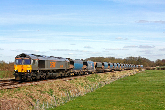 GBRf Grey liveried 66748 at Rearsby west of Melton Mowbray heading for Syston East Junction on 2.4.15 with 6M14 1046 Harlow Mill -  Bardon Hill empty aggregate hoppers