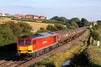 60011 at Wistow, MML heading towards Leicester on 4.9.12 with 6E38 1354 Colnbrook Elf Oil Siding -  Lindsey Oil Refinery empty bogie tanks in lovely sunny evening light
