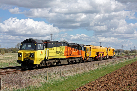 Colas Rail 70806 with Network Rail Tamper No DR73117 at Uffington near Peterborough on 11.4.15 with 6Z12 1115 Norwich Thorpe Ce Sidings - Rugby D.E.D. move