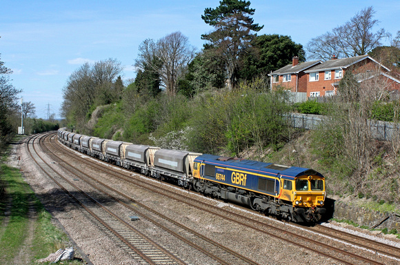 GBRf 66744 'Crossrail' rounds the curve at Barrow Upon Soar, MML on 14.4.15 with 6M01 1051 Tinsley Yard - Bardon Hill empty 4 Wheel aggregate hoppers