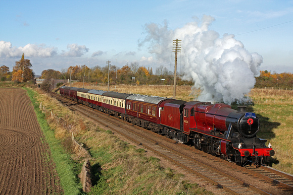 Red 8F No 48624 adorned with a Poppy Wreath for Remembrance Sunday at  Woodthorpe, GCR on 11.11.12 with 1315 Loughborough - Leicester North  'The Elizabethan' Sunday Luncheon Dining service