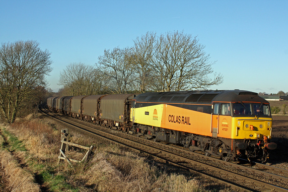 47727'Rebecca'  in Colas Livery at Chellaston heading towards Castle Donington on 5.12.12 with 6E07 1151 Washwood Heath - Boston Docks empty covered IHA steel carriers in lovely winter sun