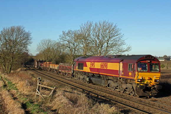 66098 at Chellaston heading towards Castle Donington on 5.12.12 with 6D44  1109 Bescot Up Engineers Sidings to Toton North Yard short t departmental train  in lovely winter sun