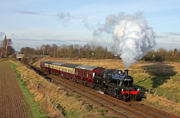 LMS Ivatt Class 2 No 46521 powers through Woodthorpe Cutting on 2.12.12 with 1315 'The South Yorkshireman' Loughborough - Leicester North GCR dining train