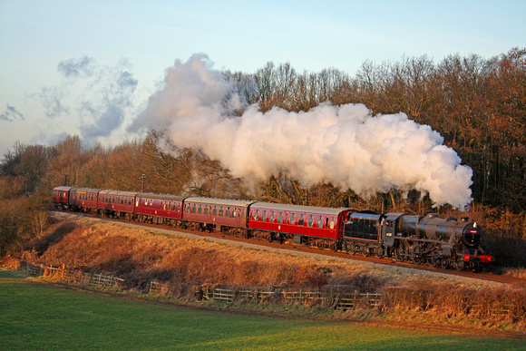 LMS Black 5 No 44767'George Stephenson at Kinchley Lane on 31.1.10 with 1545 Loughborough - Leicester North service at the GCR Winter Steam Gala January 2010 in the low setting sun