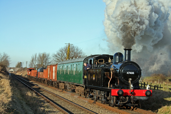 LMS Jinty 47406  powers along the Quorn Straight on 30.1.10 with 1350 Loughborough - Rothley Brook mixed freight at the GCR Winter Steam Gala January 2010
