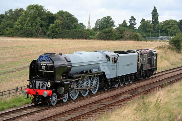 Class 10 D4067 drags Peppercorn Class A1 60163 Tornado built by A1 Steam Locomotive Trust  after its arrival at Quorn Yard, GCR to Loughborough and is seen at Woodthorpe 20.8.08 for high speed testing