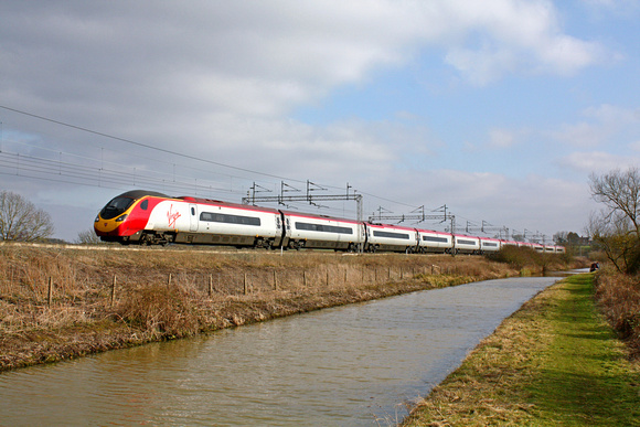 Virgin Pendolino Class 390 No 390103 at Ansty nr Nuneaton alongside  Oxford Canal on 20.2.13 with 1H68 1340 London Euston - Manchester Piccadilly service