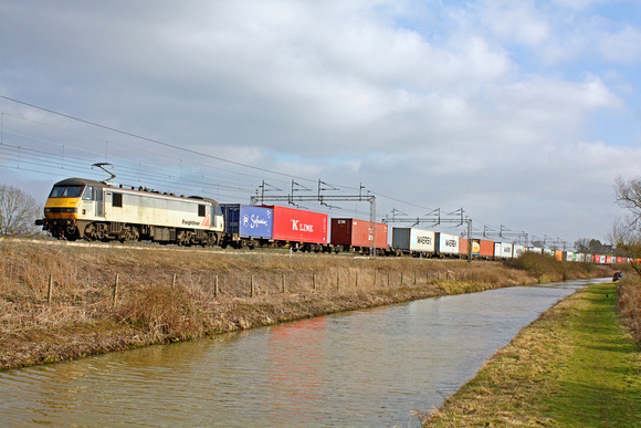 90044 at Ansty nr Nuneaton alongside  Oxford Canal on 20.2.13 with 4M81 0730 Felixstowe - Basford Hall, Crewe well loaded  Freightliner train
