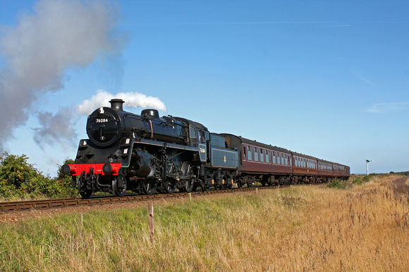 BR Standard 4 No 76084 approaches Weybourne seen close to Sheringham Park on the North Norfolk Railway on 01.10.15 with 1200 Sheringham - Holt service
