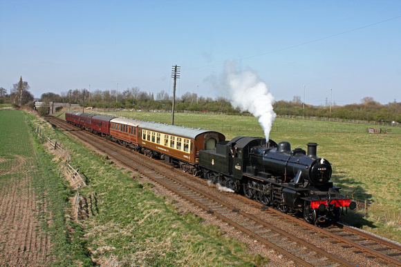LMS Ivatt Class 2 2-6-0 No 46521 at Woodthorpe, on 20.4.13 with 1615 Loughborough - Leicester North GCR service with an interesting mix of coaches