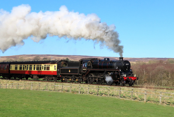 BR Standard 4MT No. 76079 approaches Moorgates, NYMR on 27.3.23 with 1410 Whitby to Pickering service on the first day of the 2023 timetable (SMB)