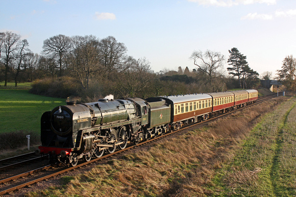 BR Standard Class 7 No 70013 'Oliver Cromwell' glints in the sun at Woodthorpe on 2.1.15 with 1400 Leicester North - Loughborough GCR Christmas Holiday Service