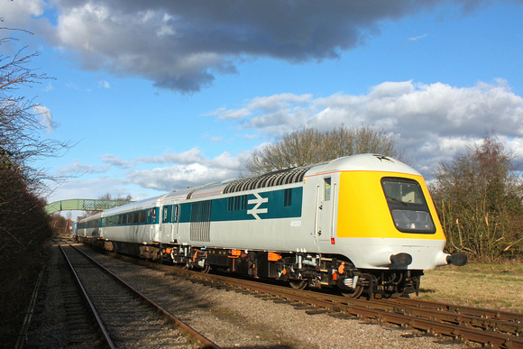 Prototype HST Power Car 41001 and matching 3 coaches recently repainted is seen at Ruddington South on 14.2.16 with 1500 Ruddington - Loughborough GCRN service. Class 73, E6016 (73110) is at the far e