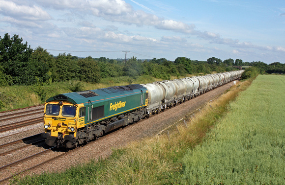 66548 is seen at Cossington, MML heading towards Syston East Junction on 9.7.14 with 6V94 0735 Hope (Earles Sidings) Fhh to Theale Lafarge Fhh  loaded cement tanks