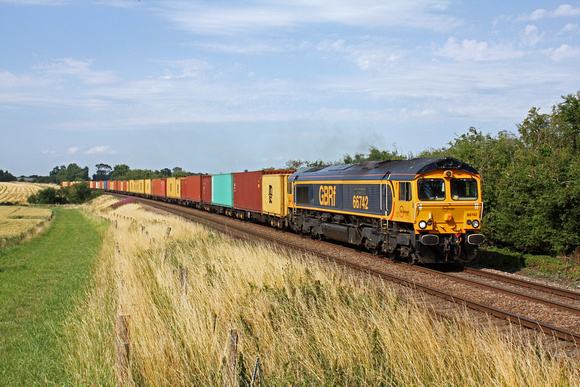 GBRf 66742'Port of Immingham Centenary 1912 - 2012' approaches Langham Junction heading towards Peterborough on 1.8.13 with 4L22 1435 Hams Hall - Felixstowe South Intermodal