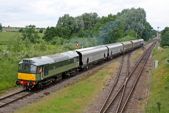 D7612 drags GBRf 66749 in grey livery with 4 biomass hoppers at Quorn, GCR on 3.7.13 to begin 75mph brake and noise testing between Swithland Sdgs and Little Woodthorpe