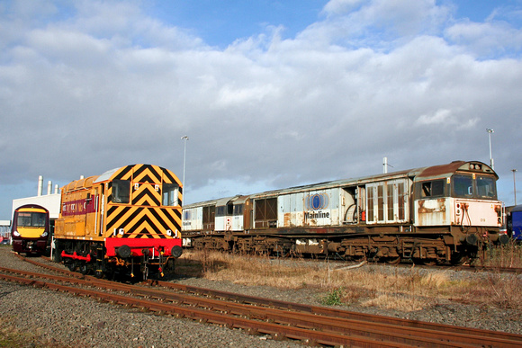 Class 08 No 08480 Toton number 1 and No 1 end of 170116 newly repainted in Cross Country Livery at Toton Paint Shop  seen on 25.1.08 along with withdrawn 58019 & 58028 languish in a siding awaiting
