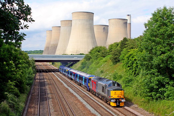 37884 drags EMU  375704 at Ratcliffe on Soar overlooked by the Cooling Towers on 17.6.16 with 5Q58 1534 Derby Litchurch Lane - Leicester L.I.P then forward to Ramsgate tomorrow due to capacity issues