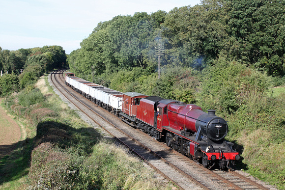 Red 8F 48624 at  Kinchley Lane  on 6.10.13 with 1430 Loughborough - Rothley Brook demo freight of mineral windcutters at the GCR  Autumn Steam Gala October 2013
