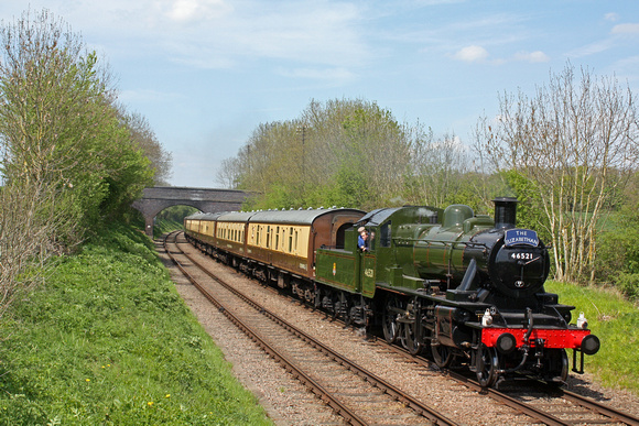 Ivatt Class 2 2-6-0 No.46521 now repainted in BR green livery approaches Swithland Reservoir near Kinchley Lane on 8.5.16 with 1315 Loughborough - Leicester North  'The Elizabethan' GCR dining train