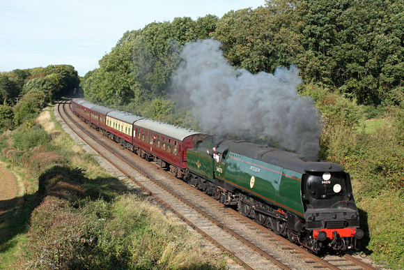 SR Battle of Britain Class No 34070'Manston' at  Kinchley Lane  on 6.10.13 with 1345 Loughborough - Leicester North service service at the  GCR  Autumn Steam Gala October 2013