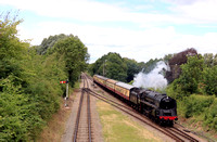 BR Standard Class 9F 92214 approaches Quorn and Wodehouse Station on 1.7.23 with 1400 Loughborough - Leicester North GCR service