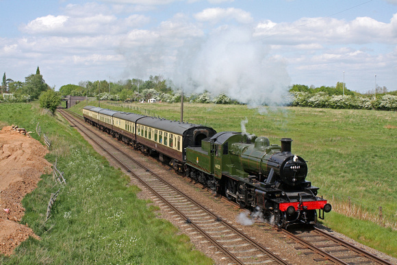 Ivatt Class 2 2-6-0 No.46521 now repainted in Brunswick green livery charges through Woodthorpe on 14.5.16 with 1415 Loughborough - Leicester North GCR service  on a beautiful Spring afternoon