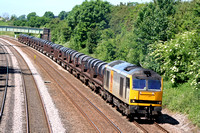 60077 in two tone grey livery at Normanton on Soar heading towards Loughborough on 9.6.08 with 6M96 0546 Margam - Corby BSC loaded steel coil wagons