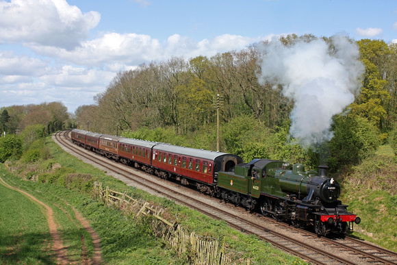 In lovely Spring conditions Ivatt Class 2 2-6-0 No.46521 in BR green livery passes Kinchley Lane on 15.4.17 with 1400 Loughborough - Leicester North GCR service at the Easter Vintage Festival 2017