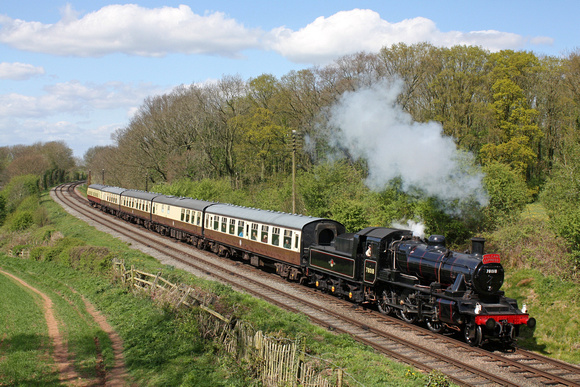 In lovely Spring conditions BR Standard Class 2MT 2-6-0 No.78018 with headboard passes Kinchley Lane on 15.4.17 with 1445 Loughborough - Leicester North GCR service at the Easter Vintage Festival 2017
