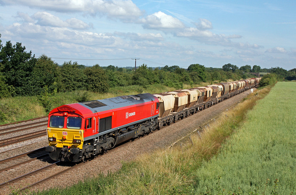 66001 in DB Schenker red is seen at Cossington, MML heading towards Syston East Junction on 9.7.14 with 6L43 0925 Mountsorrel Sdgs - Kennett Redland Siding loaded 4 wheeled hoppers