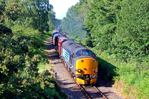 37605 and 20142 power up the cutting away from Kelling Heath station on 10.6.17  working 1648 Sheringham - Holt service  at the North Nolfolk Railway Summer 2017 Diesel Gala