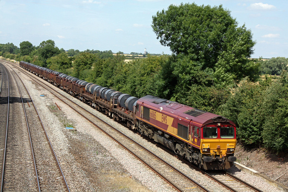 66065 in shabby external condition at Normanton on Soar heading towards Loughborough on 15.7.11 with 6M96 0550 Margam - Corby loaded coil wagons