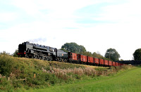 .BR Standard Class 9F 92214 passes Kinchley Lane on 8.10.23 with 1545 Swithland Sdgs to Loughborough demo van freight at GCR Autumn Steam Gala Oct 2023