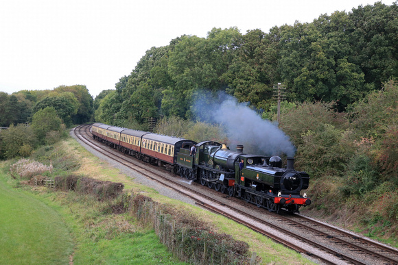 Guest Locos GWR Pannier Tank 7714 &  GWR Saint 2999 'Lady of Legend'  at a dull Kinchley Lane on 8.10.23 with 1430 Loughborough to Leicester North service  at GCR Autumn Steam Gala Oct 2023