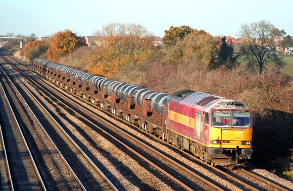 60042 is bathed in Autumn colours at Cossington, MML heading towards Syston East Junction on 23.11.07 with 6M96 0548 Margam - Corby BSC loaded steel coil wagons