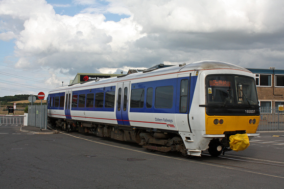 Chiltern Railways 165007 is seen about to enter Brush Traction  Works on 7.7.11 with 5Z00 1442 Banbury - Loughborough Brush for crash damage repair