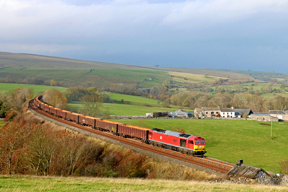 DB Cargo 60091 'Barry Needham' rounds Smardale curve on the S & C line on 6.11.18 with 6E97 1044 New Biggin British Gypsum to Tees Dock Bsc Export Berth empty MBA gypsum wagons