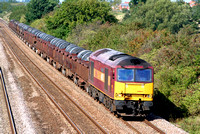 60031 at Cossington, MML heading towards Syston East Junction on 26.9.06 with 6M96 0550  Margam - Corby BSC loaded coil wagons