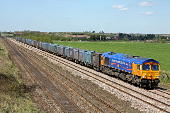 66721 'Harry Beck' at Cossington, MML heading towards Syston East Junction on 21.4.10 with 4M82 1035 Drax  Power Station - Hotchley Hill  loaded Gypsum containers