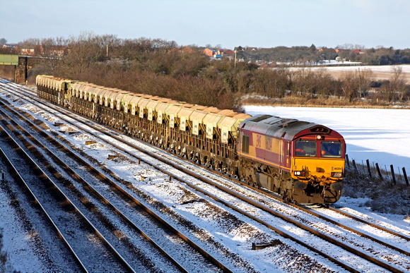 66204 trundles along the slowline at Cossington, MML on 6.1.10 with 1448 mountsorrel - Peterborough loaded 4 wheeled hoppers