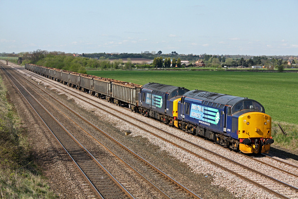 37510 and 37667 at Cossington heading towards Syston East Junction on 21 April 2010 with 6Z90 Tyne Dock - Sheerness scrap metal working