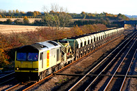 60082 at Cossington, MML on 31.10.07 with 6M70 1236 Chesterton Junction - Mountsorrel empty self discharge hoppers  glinting in the late autumn low sun
