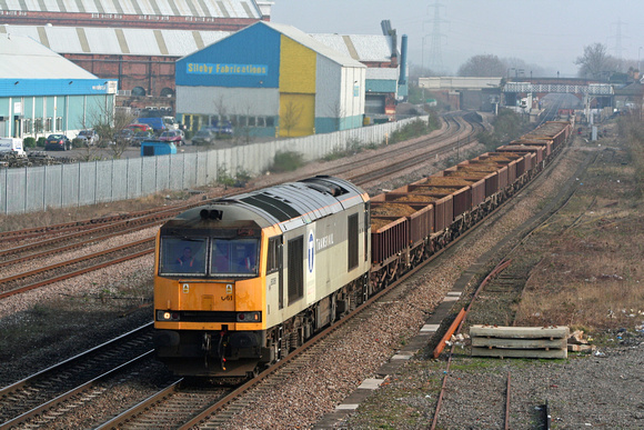 60061 in EWS two tone grey with Transrail sticker in misty conditions at Loughborough on 18.3.09 with 6D42 Forders - Toton Up Yard departmental